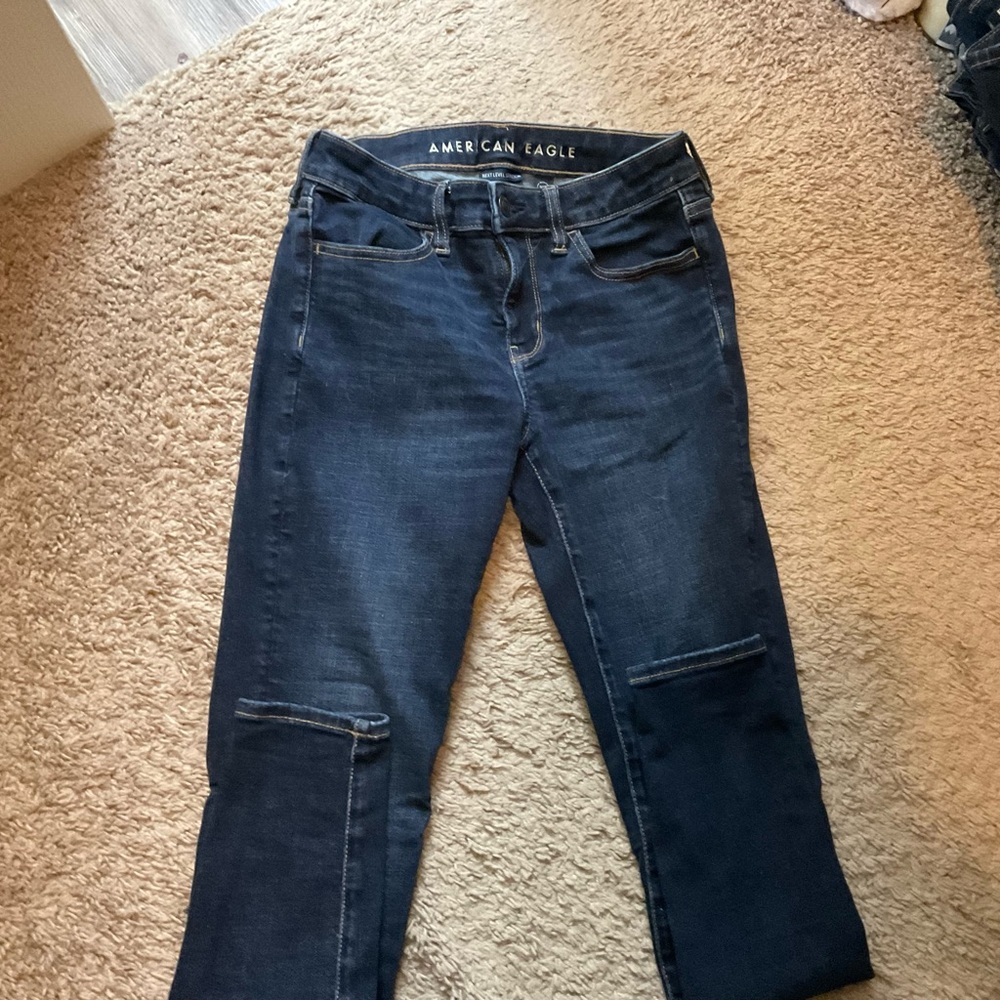 American Eagle Outfitters Blue Jeggings with Ripped Knees and Fading
